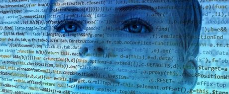 Menschlicher Kopf vor Programmiersprache Menschlicher Kopf vor Programmiersprache