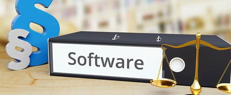 Ordner mit Aufschrift "Software" und Gesetzesparagraph Ordner mit Aufschrift "Software" und Gesetzesparagraph