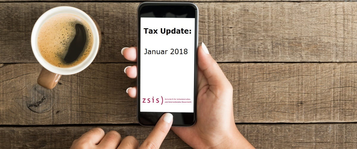 Handy mit Displayaufschrift "Tax Update Januar 2018"